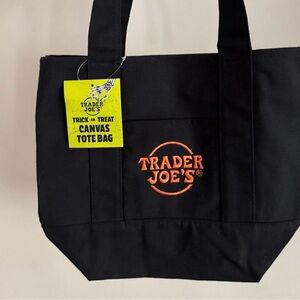 Pink and white Trader Joe’s  Tote Bag